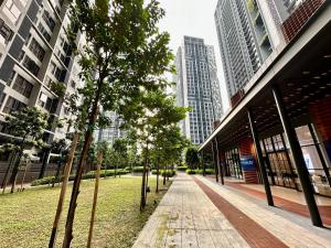 a street in a city with tall buildings at Millerz Square Mid Valley, Old Klang Road in Kuala Lumpur