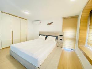 Cama o camas de una habitación en Sunway Grid Cosmo Suite WI-FI 6pax BigBOX Legoland