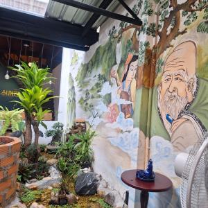 Сад в SUNZI BOUTIQUE HOSTEL : ซันซิ บูทีค โฮสเทล