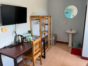 Kuchyň nebo kuchyňský kout v ubytování Guest House Blue Andaman