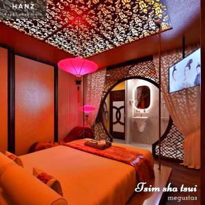 Postel nebo postele na pokoji v ubytování HANZ MeGusta Hotel Ben Thanh