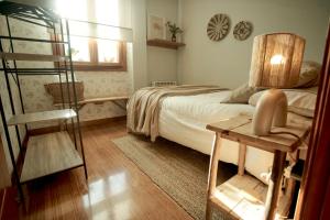 Posteľ alebo postele v izbe v ubytovaní Salamanca Rentals - Apartamento con terraza a 1 minuto de la Plaza Mayor