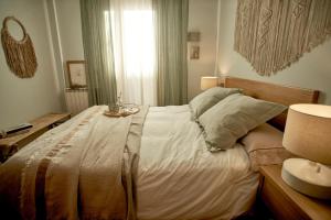 Posteľ alebo postele v izbe v ubytovaní Salamanca Rentals - Apartamento con terraza a 1 minuto de la Plaza Mayor