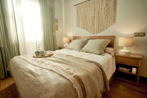 Posteľ alebo postele v izbe v ubytovaní Salamanca Rentals - Apartamento con terraza a 1 minuto de la Plaza Mayor