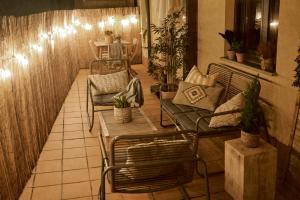 Posedenie v ubytovaní Salamanca Rentals - Apartamento con terraza a 1 minuto de la Plaza Mayor