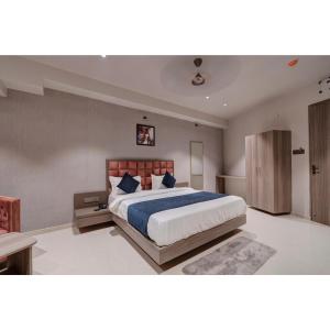 Voodi või voodid majutusasutuse Hotel Sparsh Divine toas