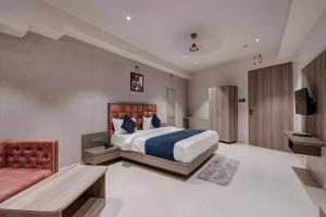 Voodi või voodid majutusasutuse Hotel Sparsh Divine toas