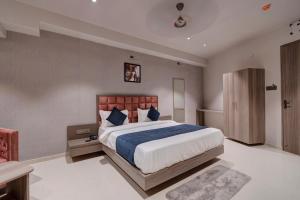 Voodi või voodid majutusasutuse Hotel Sparsh Divine toas