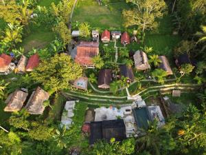 an aerial view of a model house with trees at Tetebatu Sama Sama Bungalows in Tetebatu