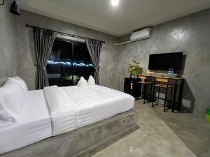 TV a/nebo společenská místnost v ubytování The Loftel Resort