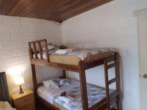 Poschodová posteľ alebo postele v izbe v ubytovaní CASA ENTERA HERMOSA