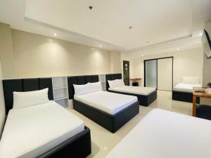 Letto o letti in una camera di Central Block Inn