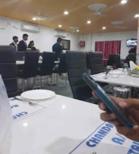 A restaurant or other place to eat at Hotel Chandan,Bhubaneswar