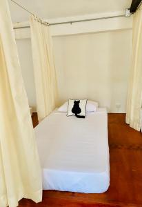 Postel nebo postele na pokoji v ubytování Hostal Patio del Río