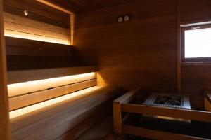 Μία ή περισσότερες κουκέτες σε δωμάτιο στο Finlandia Hotel Alba