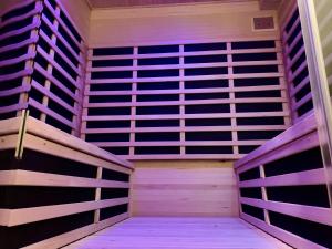 a empty sauna with two bunk beds in it at EVA o Wellnessoasis o Montainview o Pizzaoven o in Ingenbohl