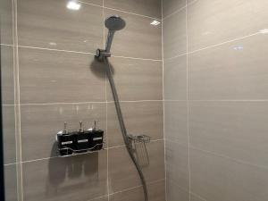Koupelna v ubytování Deluxe Suite in One Uptown, BGC with Mall Fountain View