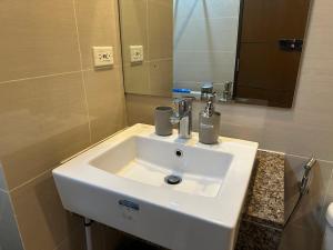 Koupelna v ubytování Deluxe Suite in One Uptown, BGC with Mall Fountain View