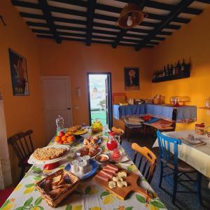 a table with food on it in a room at Due Passi Dal Centro in Marsala