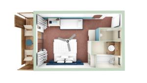 un disegno di un piccolo appartamento con una camera di Dimitile Hôtel & Spa a Entre-Deux