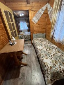 Postel nebo postele na pokoji v ubytování Sadyba Dana