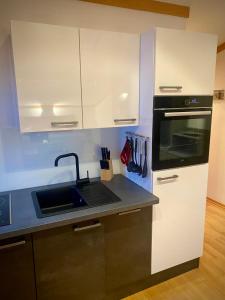 Kuchyňa alebo kuchynka v ubytovaní Apartment Schmitten 67