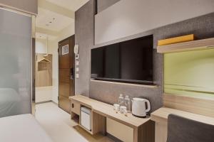 Katil atau katil-katil dalam bilik di Orange Hotel -Hanzhong, Taipei