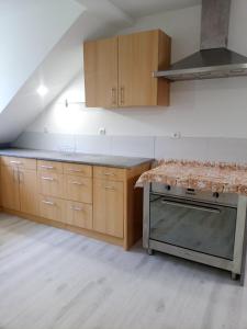 Η κουζίνα ή μικρή κουζίνα στο Gîte Maisons Bleues chez A et A WOLFF