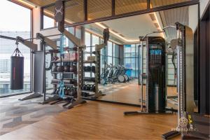 a gym with cardio equipment in a building at ViiA Residence, Mid Valley KL in Kuala Lumpur