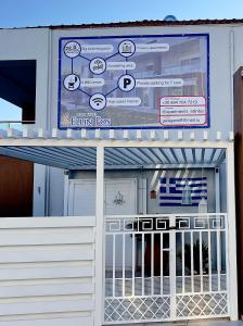 Certifikát, hodnocení, plakát nebo jiný dokument vystavený v ubytování EllinFos Apartments