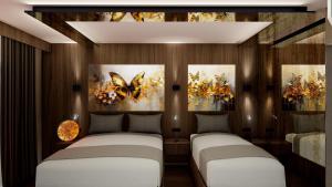 Cama o camas de una habitación en duqqan deluxe hotel