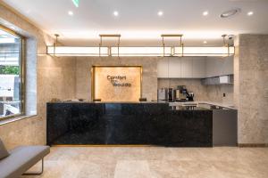 Kuchyň nebo kuchyňský kout v ubytování Comfort inn Yeouido