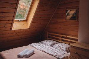 Postel nebo postele na pokoji v ubytování Mountain Cottage Lubomierz