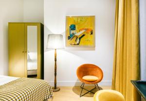 A bed or beds in a room at Joya del Casco Boutique Hotel by Shiadu