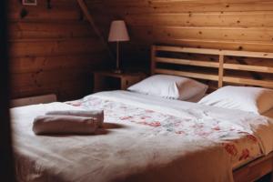 Posteľ alebo postele v izbe v ubytovaní Mountain Cottage Lubomierz