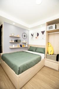 Llit o llits en una habitació de 101 - Homestay chill in the center of Sai Gon