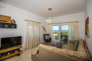 A television and/or entertainment centre at Istron MiraBella Villas