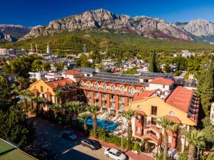 una vista aérea de una ciudad con montañas en el fondo en ASTORIA PARK Hotel & Spa ALL INCLUSIVE, en Antalya