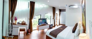 TV a/nebo společenská místnost v ubytování Big Hotel Lào Cai