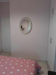 Cama ou camas em um quarto em Dimitris