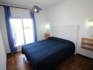 Posteľ alebo postele v izbe v ubytovaní MORÉ I 1 DRTA - Apartamento con vistas al mar, barrio tranquilo con jardín. - ES-228-54