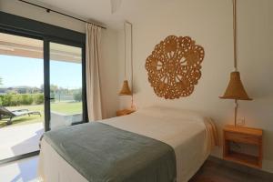 Ένα ή περισσότερα κρεβάτια σε δωμάτιο στο Bajo con vistas increíbles