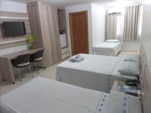 Cama ou camas em um quarto em Hotel CTC mais 37 fotos