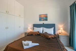 Postel nebo postele na pokoji v ubytování Istron MiraBella Villas