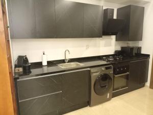 مطبخ أو مطبخ صغير في Appartement Parc Mohammedia