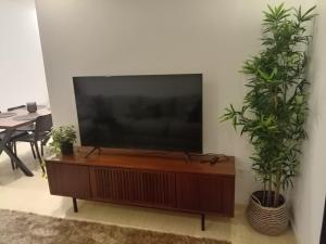 تلفاز و/أو أجهزة ترفيهية في Appartement Parc Mohammedia