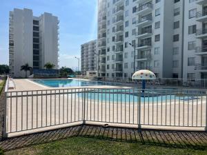 Bazén v ubytování Hermoso apartamento para descansar en familia nebo v jeho okolí
