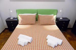 Postel nebo postele na pokoji v ubytování Atriums Apartment Massaua