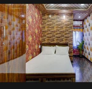 Cama o camas de una habitación en JK Residency