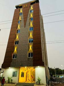 a tall building with lights on the side of it at Hotel Park Airport Zone Hyderabad in Shamshabad